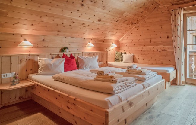 Hüttenzimmer in einem der Chalets in der Almwelt Austria in Schladming