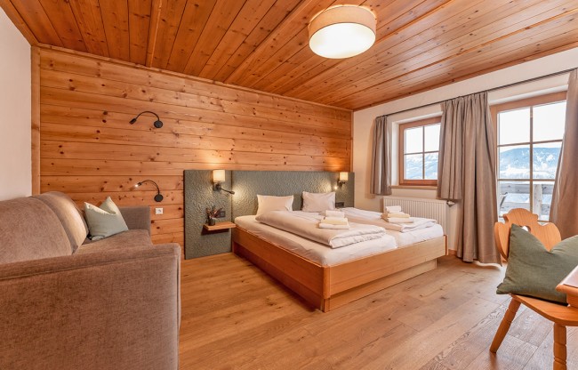 Hüttenzimmer in einem der Chalets in der Almwelt Austria in Schladming