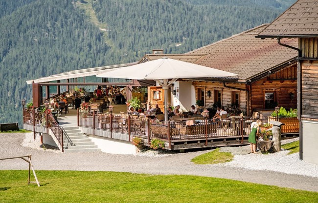 Schnepf'n Alm terrace at summer time