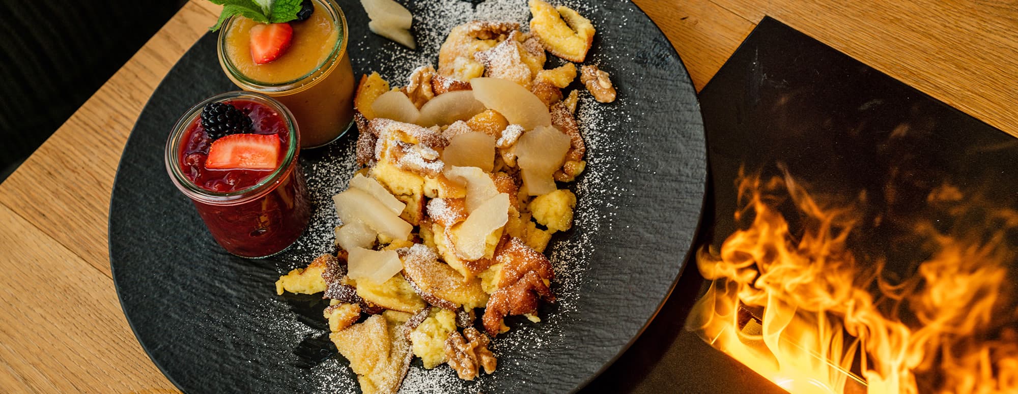 Kuinarische Genüsse im Restaurant Schnepf'n Alm im Hüttendorf der Almwelt Austria