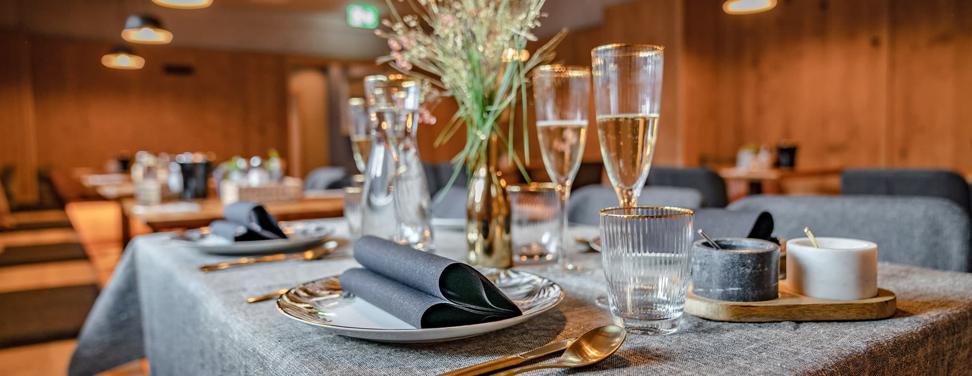 Golden breakfast table with champagne